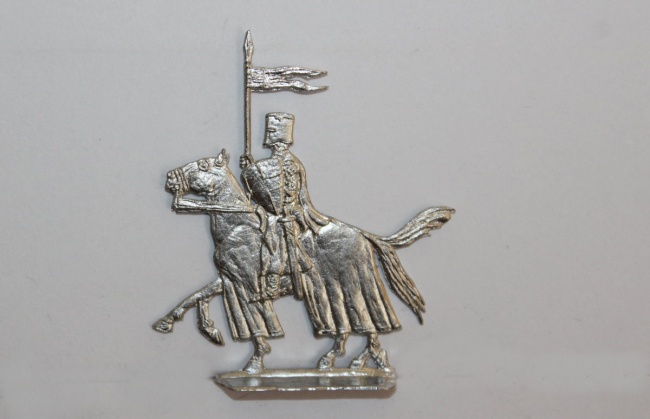Ritter zu Pferd mit Lanze und Schild